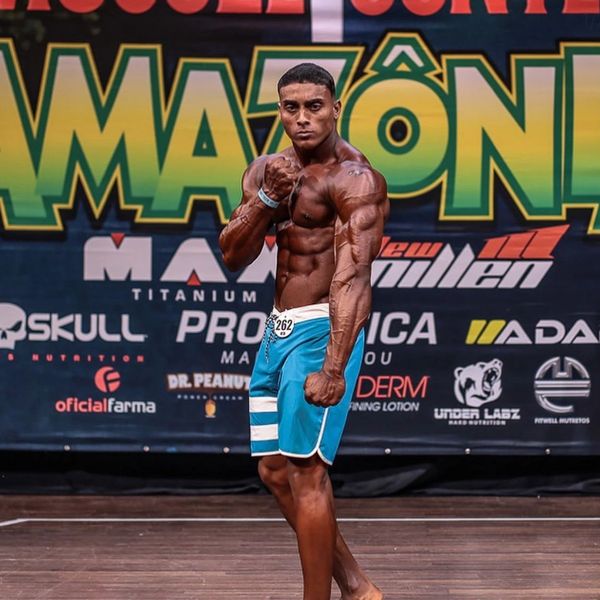 Man posing on stage