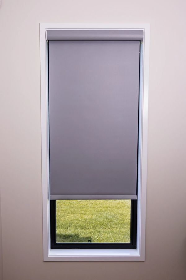 Shutter Force roller blind in window