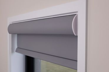 Shutter Force roller blind in bedroom window