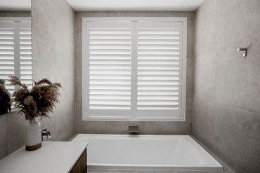 Plantation shutters in bathroom