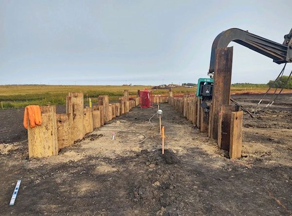 a sheet piling installation for an excavation to install a road bore or creek crossing