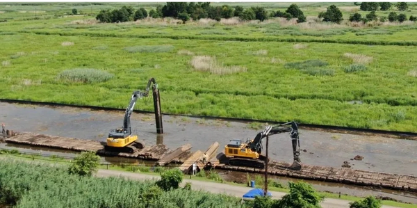 Sheet piling installation in a marsh for a pipeline, this will stabilize the trench and keep it dry
