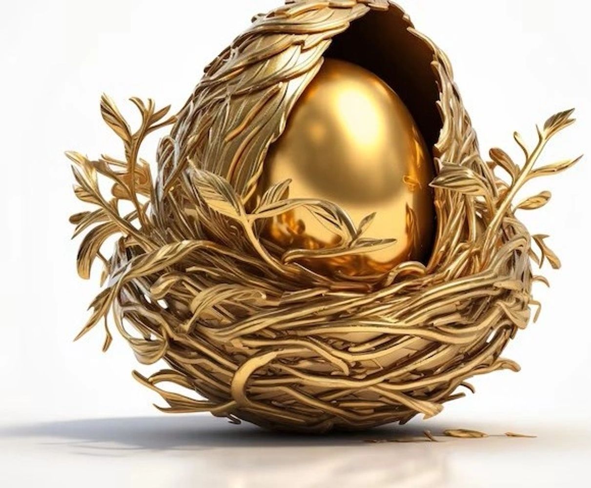 small golden egg in a nest