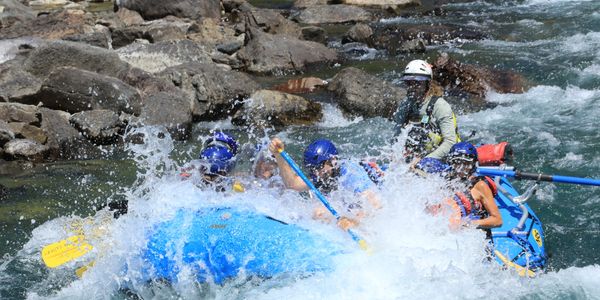 Luca guides a group of clients down Bonecrusher rapid on the Middle Fork of the Flathead River.