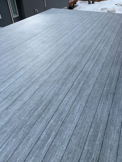 A Dark Color Panel Flooring for a Deck Space