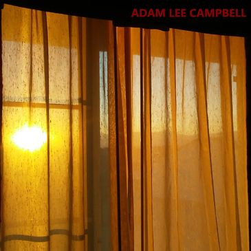 Sunlight glows softly through sheer curtains at sunset.