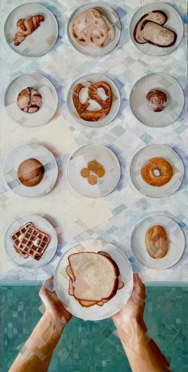 Various baked goods on plates with hands holding a sandwich at the bottom.