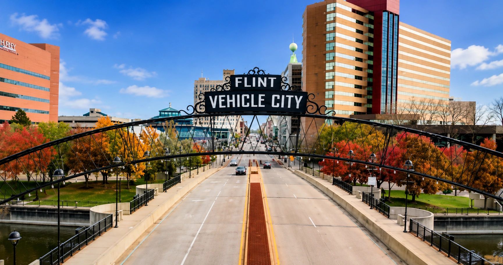 Flint Vehicle City street view with fall trees.
