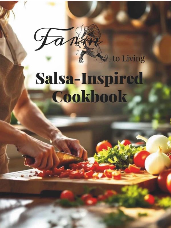 Woman chopping salsa vegetables in a kitchen.