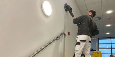 Commercial office painting with dust-free sanding technology 