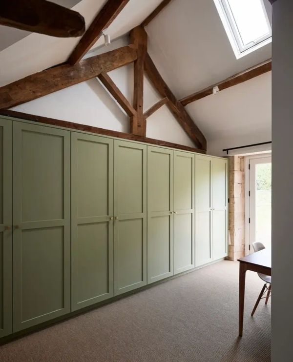 Bespoke fitted wardrobes finished in heritage green