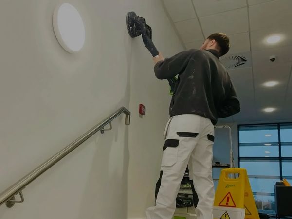 RH Smith Decorator using dust-free sanding technology to help with surface preparation 