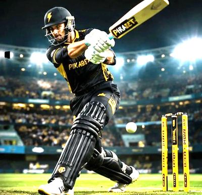Cricket player in action during a night match, wearing black and yellow.