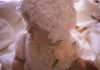 Grace's Christening bonnet was created from the left-over lace of her mother's wedding dress alteration!