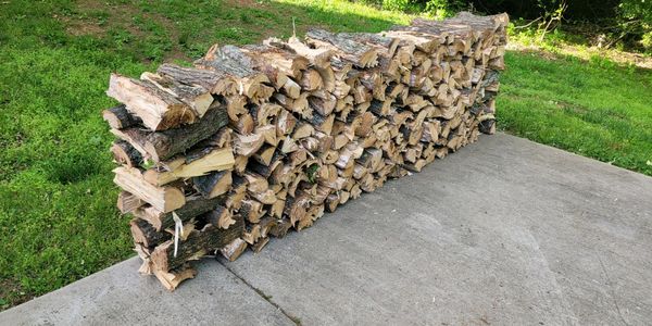 Rick of hardwood split and stacked by Clarksville Firewood 