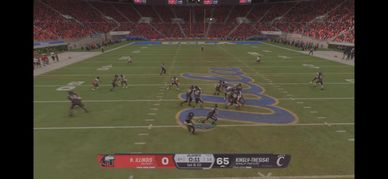 College football game with Cincinnati leading against Austin Peay.