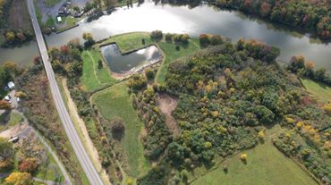 Aerial view of the pond and property