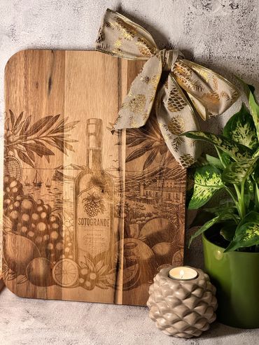 Limited edition We Laser Art Sotogrande Charcuterie Board available at Amaranto Sotogrande 