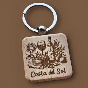 Wood keychain engraved by We Laser Art, laser engraving specialists on the Costa del Sol, Spain 