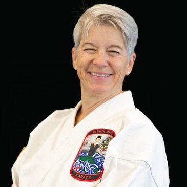 Sensei Kathy Shawl fourth degree Black Belt in Isshinryu Karate