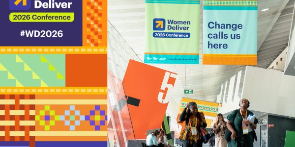 Women attending the Women Deliver 2026 Conference with colorful banners and signage.