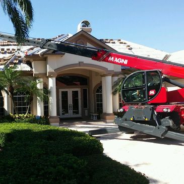 Magni being used to load a roof with tile
