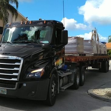 Black truck Loaded With Tile