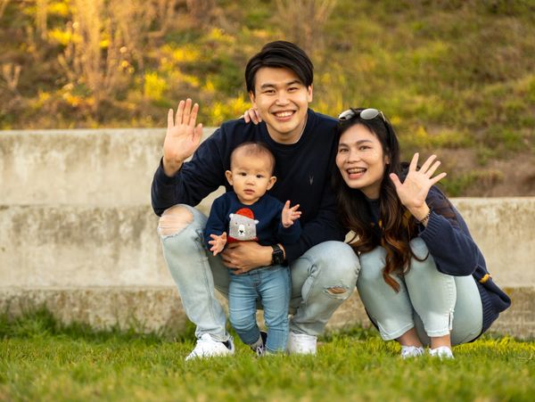 Family Photoshoot in San Francisco, Family waving at camera