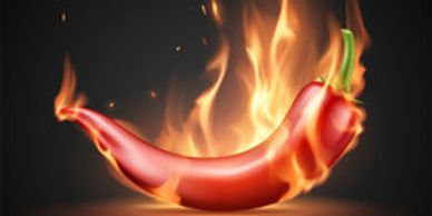 A red chili pepper engulfed in flames symbolizing extreme spiciness.