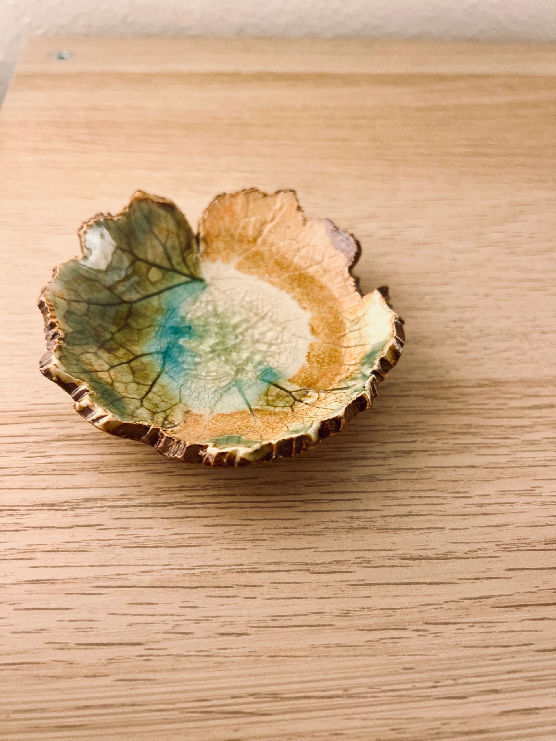 Leaf full of water to catch any emotional releases from massage at The Surrenderance.