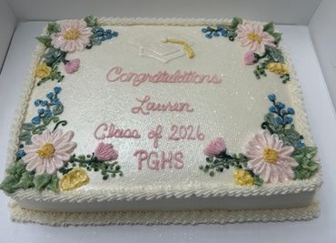 A decorated graduation cake congratulating Lauren, Class of 2026 at PGHS.