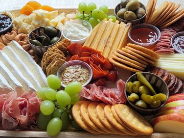 Artisan cheeses, cured meats, fresh & dried fruits, pickled items, mixed nuts, crackers & spreads