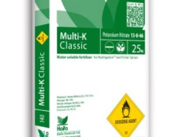 A bag of Multi-K Classic water-soluble potassium nitrate fertilizer with hazard warning.