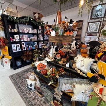 Shop filled with fall and Halloween decorations.