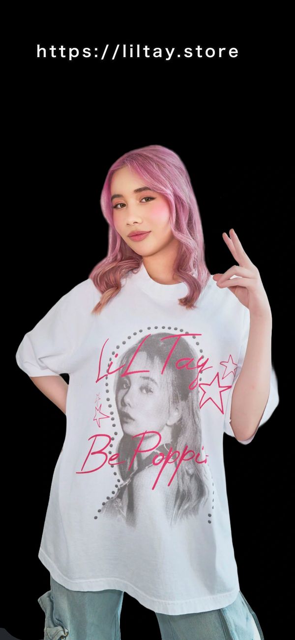 LILTAY BEPOPPIN white merch tee shirt with a held peace sign black background 