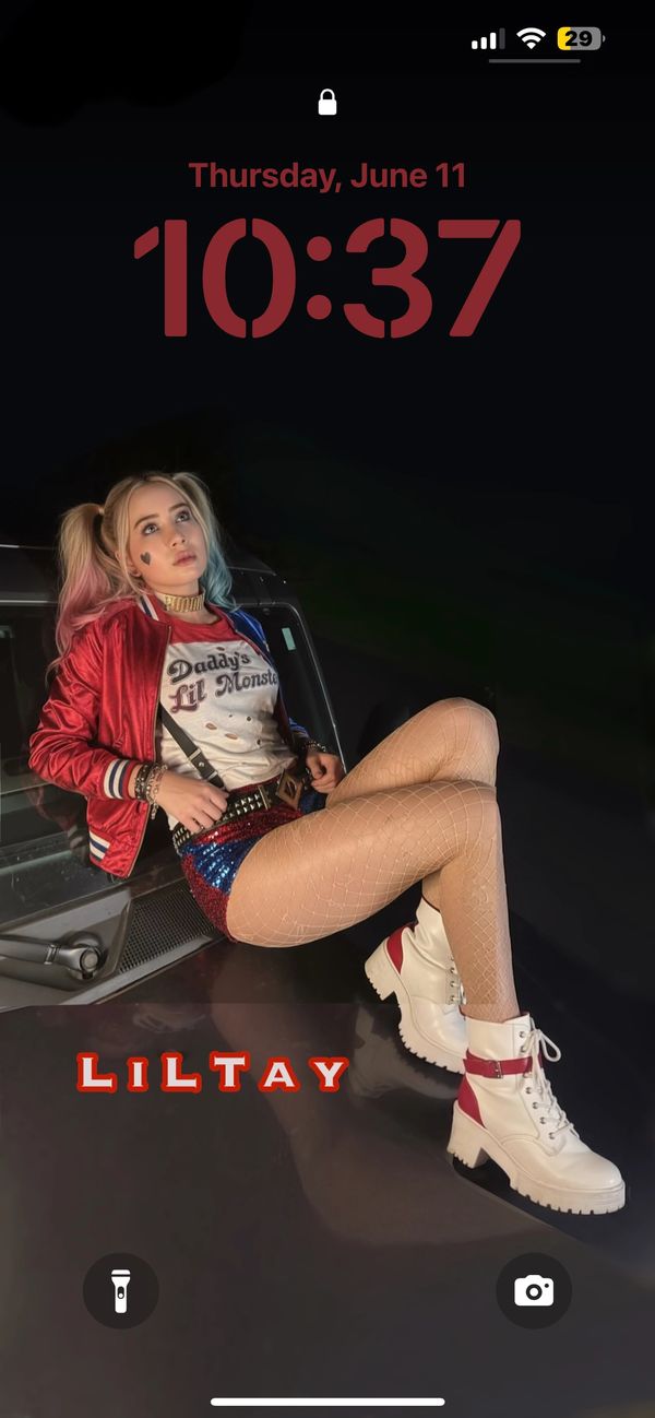 LiLTay squad time sitting on a truck hood lock screen wallpaper