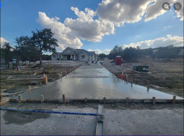 Best Concrete Contractor in Bulverde Finishing a Concrete Driveway and sidewalk