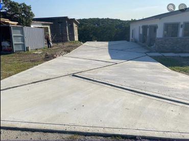 Best Concrete Contractors Bulverde getting a Brick in lay concrete driveway ready