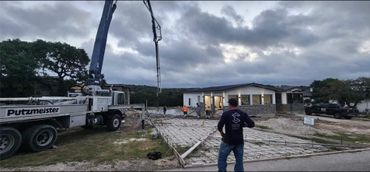 Best Concrete Contractors in Bulverde Texas finishing a extra Large concrete driveway