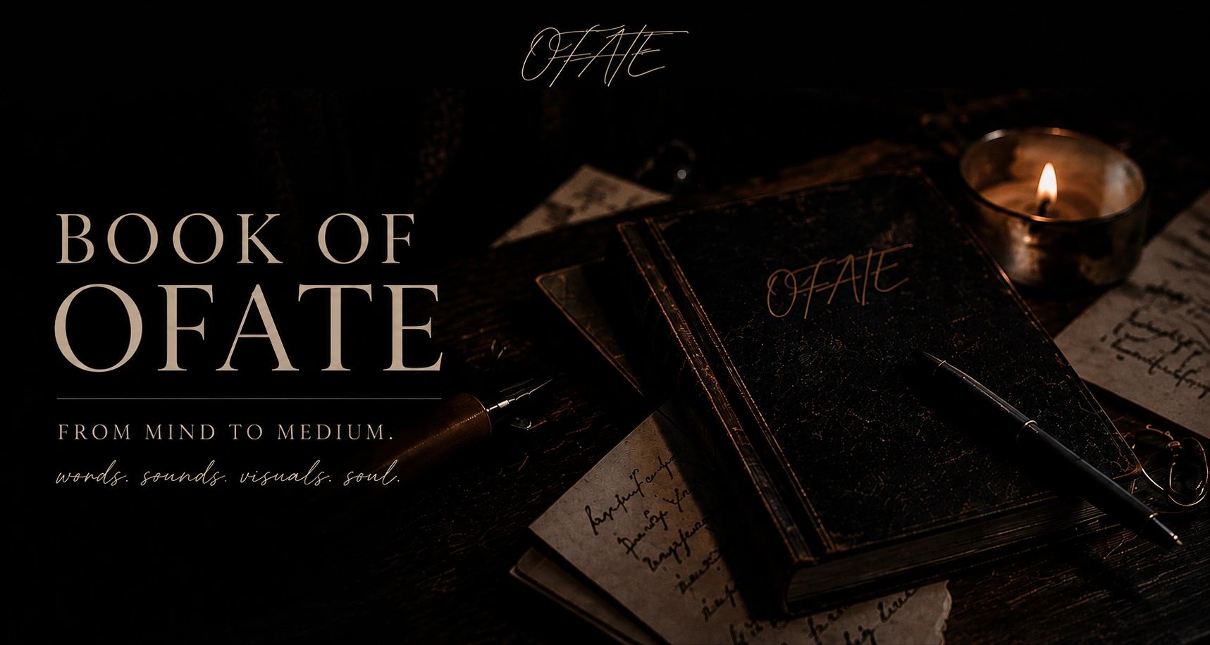 Dark vintage book titled 'OFATE' with a pen and candle on a wooden desk.