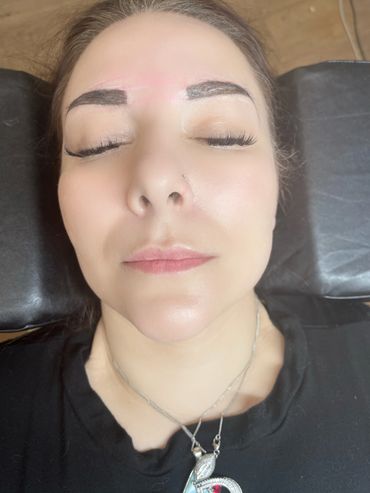 a woman closing her eyes