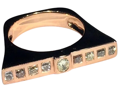 An 18kt Rose Gold Ring
set with Colored  Diamonds