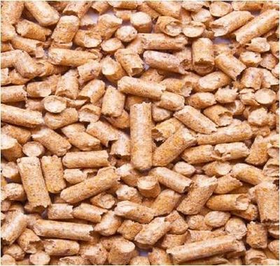 Close-up of cylindrical wood pellets used as fuel.