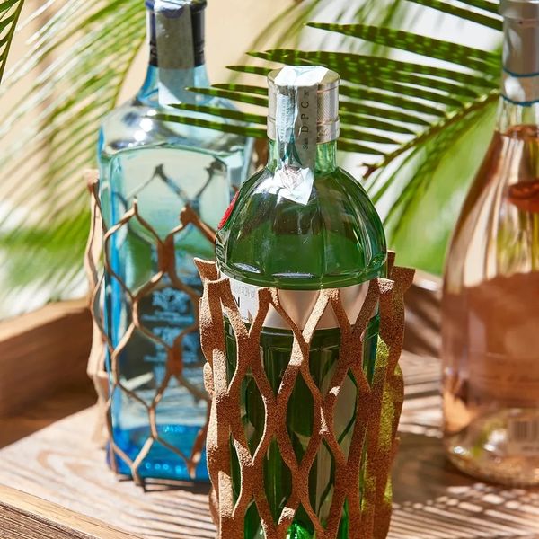 The Suber Sleeve. Universal eco-friendly wine & spirits bottle protective sleeve.