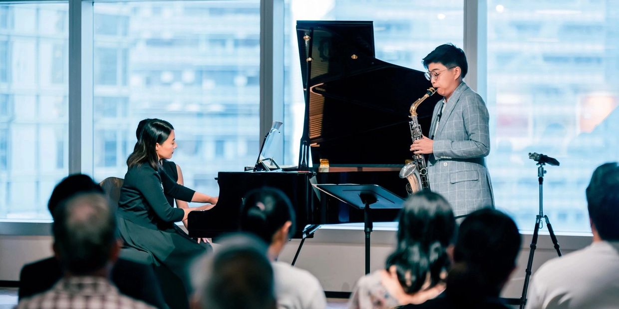 香港色士風演奏家 Yin Tak Au performing with pianist Dr. Cherry Tsang at Eaton Club.