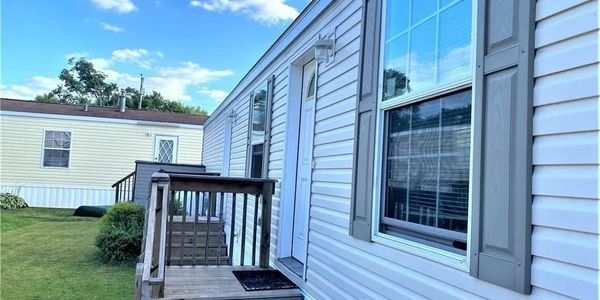 entrance of white mobile home