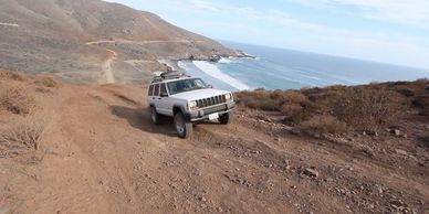 Jeep Cherokee Climbing hill Baja 500 racecourse Northern Baja