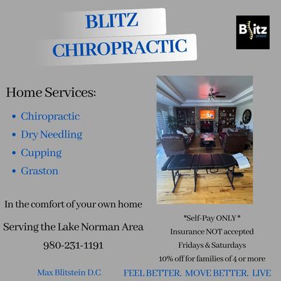 A scenic view featuring mountains, a clear blue sky, and lush green trees.