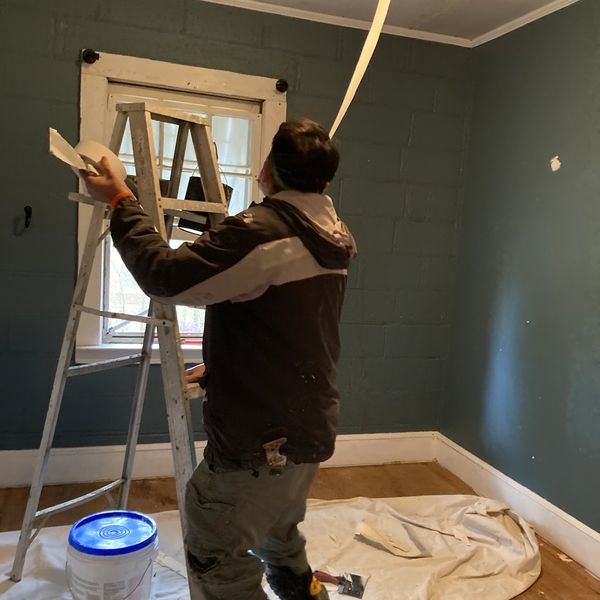 Man remodeling the ceiling.