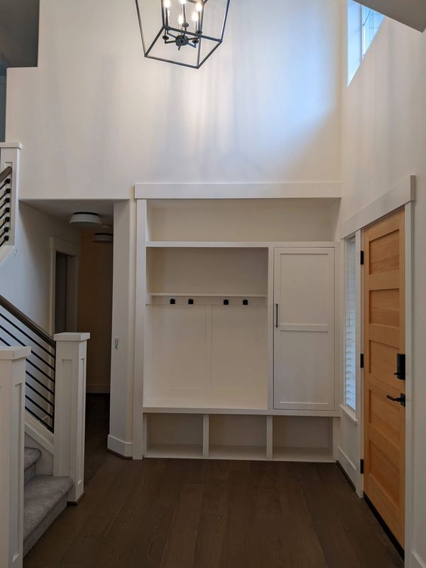 mudroom, entry with built-ins, custom trim and molding, custom cabinetry